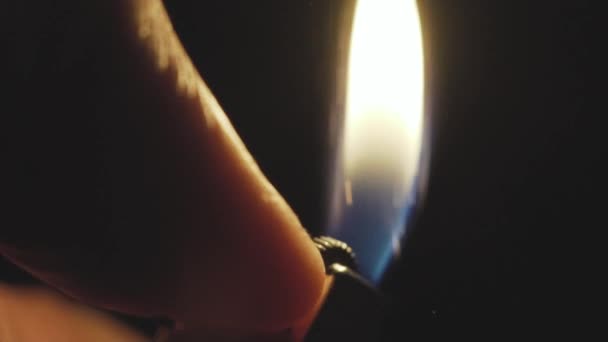 Close up slow motion shot of lighter on the man hand — Stock Video