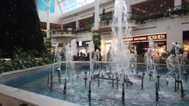 LVIV, UKRAINE - DECEMBER 29, 2019: Shooting in the mall before the new year.