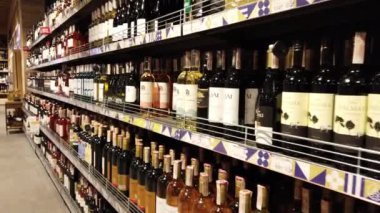 LVIV, UKRAINE - DECEMBER 29, 2019: Wine bottles in the supermarket.