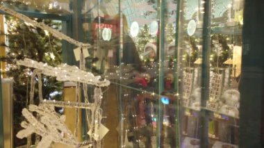 LVIV, UKRAINE - DECEMBER 29, 2019: Shooting a Christmas shop window.