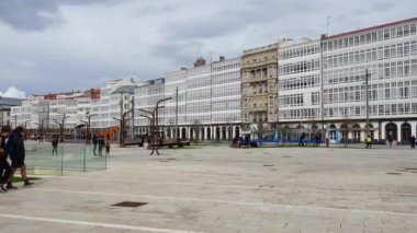 LA CORUNA, SPAIN - APRIL 1, 2018: Unknown people on the embankment of the city.
