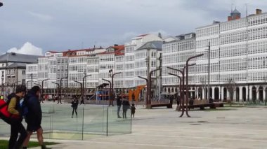 LA CORUNA, SPAIN - APRIL 1, 2018: Unknown people on the embankment of the city.