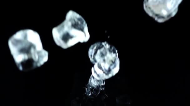 Falling Cubes Ice Black Background Slow Motion — Stock Video