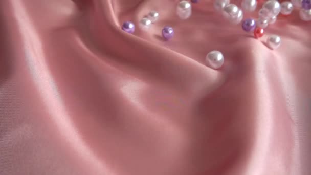 真珠は絹の上に落ちる スローモーション — ストック動画