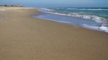 Deniz ve sahil. Sahilde çekim yapmak. Harekette çekim..