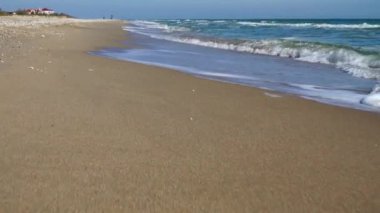 Deniz ve sahil. Sahilde çekim yapmak. Harekette çekim..