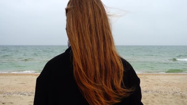 Girl Looks Sea Slow Motion Shooting Beach — Stock Video