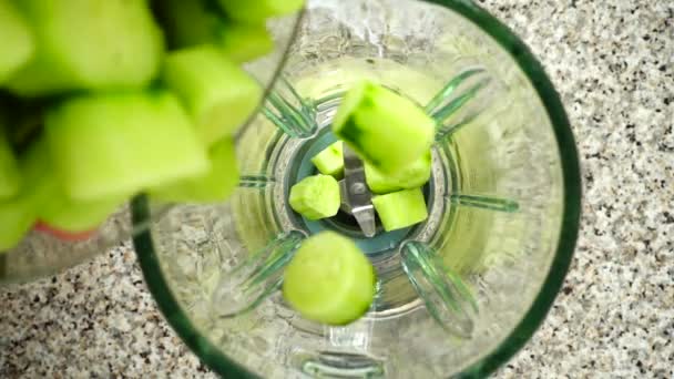 Falling Cucumbers Blender Bowl Slow Motion Shooting Kitchen Top View — Stock Video