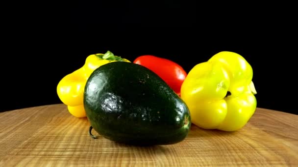 Avocado Sweet Pepper Chili Pepper Cutting Board Shooting Black Background — Stock Video