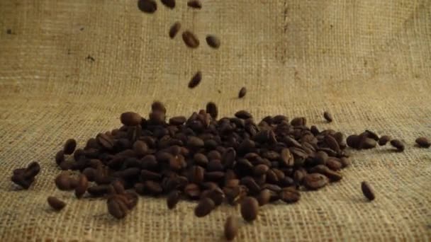 Coffee Beans Fall Burlap Slow Motion — Stock Video