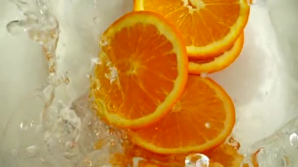 Oranges Falling Water Slow Motion — Stock Video