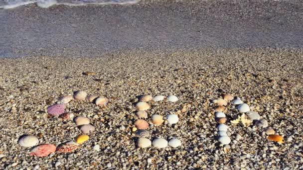 Iscrizione Mare Sulla Sabbia Girare Sulla Spiaggia — Video Stock