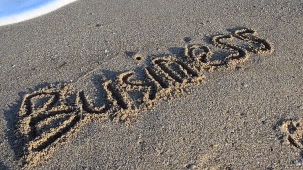 Inscription Business Sand Inscription Washed Away Sea Wave Shooting Beach — Stock Video