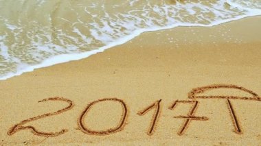 2017 'de kumsala yazılmış bir yazı. Sahilde çekim yapmak..