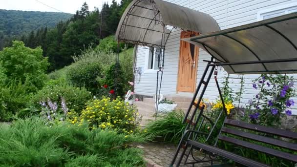 Swing and house. Architecture of the village — Stock Footage Swing House Architecture Village Video Clip