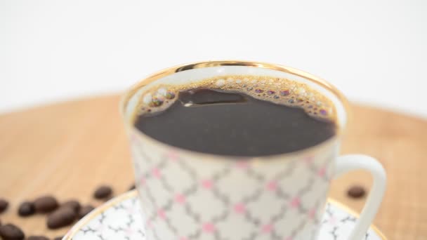 Kaffee Kaffeetasse Und Körner Schießen Der Bewegung — Stockvideo