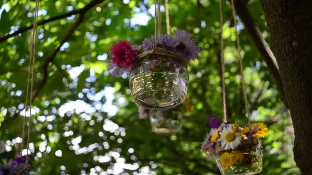 Flowers Glass Jars Installation Park Basket Flowers Tree Branches — Stock Video