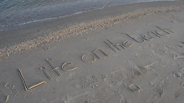 Iscrizione Sulla Sabbia Sulla Spiaggia Vita Sul Concetto Spiaggia Iscrizione — Video Stock