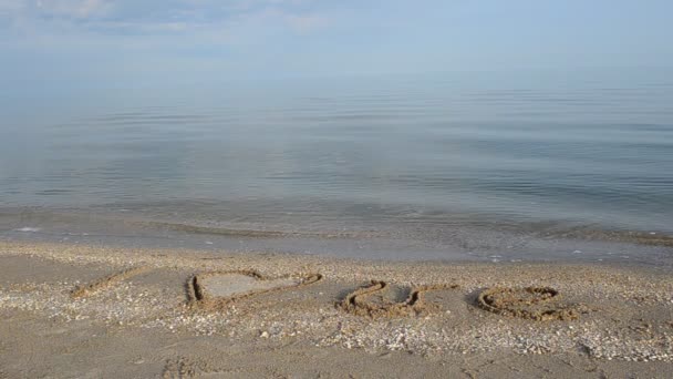 Iscrizione Sulla Sabbia Adoro Spiaggia Mare — Video Stock