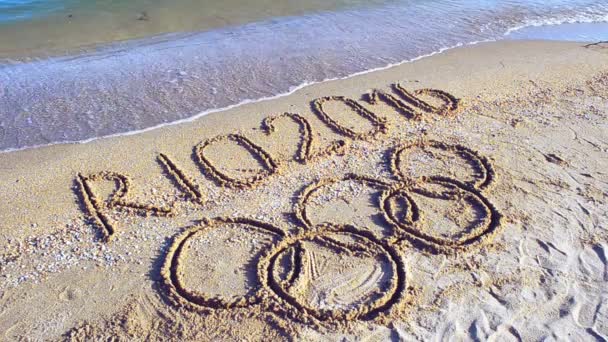 Rio 2016 Iscrizione Sulla Sabbia Spiaggia Simbolo Gioco Olimpico Sulla — Video Stock