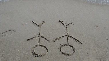 Kumsalda, kumsalda, kumsalda, yazlıkta. Sahilde çekim yapmak..