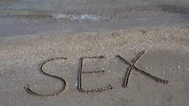 Секс Руки Написанный Песком Пляже Стрельба Пляже — стоковое видео