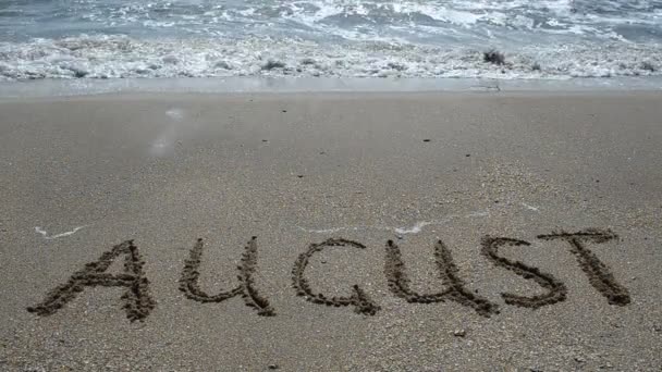 Inschrift Des Monatsnamens Auf Sand Strand Schießen Strand — Stockvideo