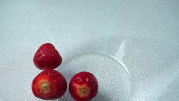 Falling Strawberry Glass Bowl Slow Motion — Stock Video