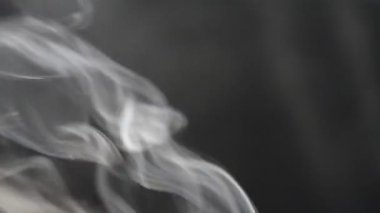 Duman ve arka plan. Dumandan garip şekiller.