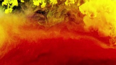 Soyut formlar. Siyah arka planda çekim yapmak. Boyaların karıştırılması.