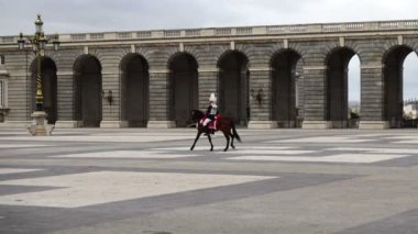 MADRID, SPAIN - APRIL 04, 2018: The ceremony of the Solemn Changing of the Guard at the Royal Palace of Madrid. That is famous event performed on the first Wednesday of each month.