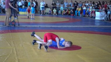 BERDYANSK, UKRAINE - 12 Haziran 2018: Uluslararası spor sınıfı Vladimir Fedorenko 'nun onuruna düzenlenen ilk Ukrayna serbest güreş turnuvası.