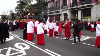 MADRID, SPAIN - MARCH 25, 2018: The celebrations of Holy Week in Madrid, began at the Cathedral of La Almudena with the solemn Mass of the Palm Trees, with the blessing of the palms and the bouquets.