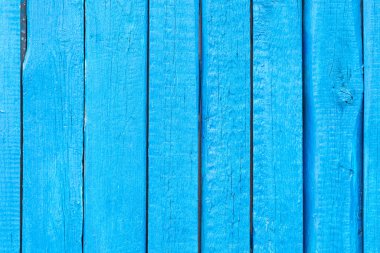 Çizik ve çatlaklarla dolu eski mavi ahşap doku..