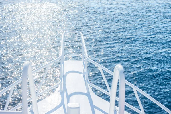 Beautiful white yacht bow on water background — Stock Photo, Image