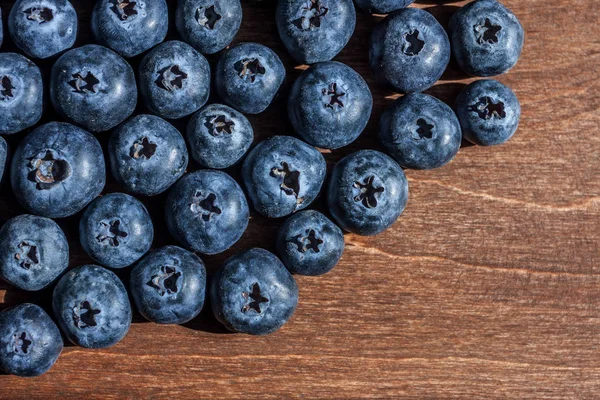 Fresh big blueberries on wooden background — Stock Photo, Image