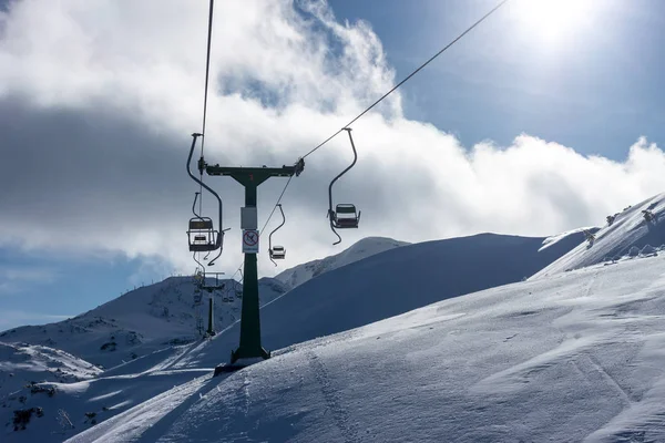 Winter ski resort chairlift — Stock Photo, Image