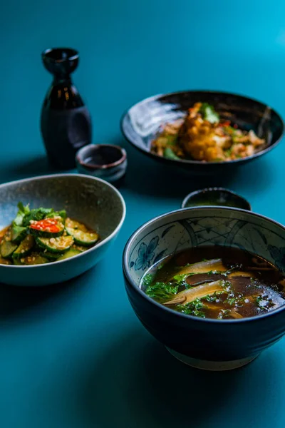 Asian Style Food Delicious Oriental Dishes Bowls Blue Background — Stock Photo, Image