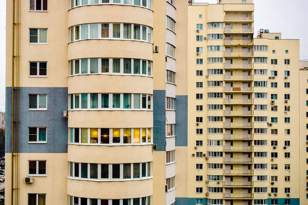 multi-storey houses with bright rskraskoy on a cloudy day 