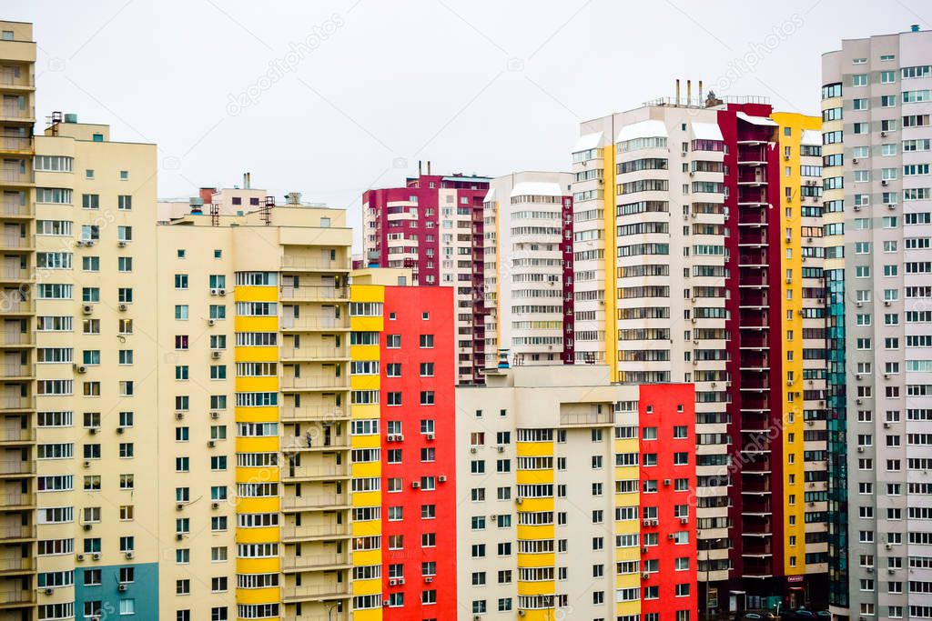 multi-storey houses with bright rskraskoy on a cloudy day 