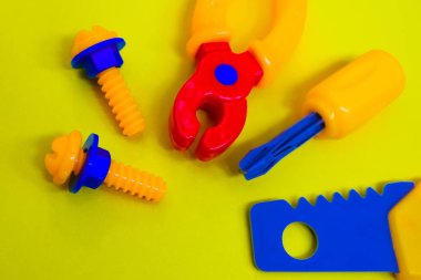 products made of colored plastic-toys and tools 