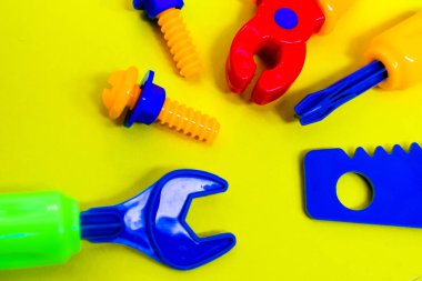 products made of colored plastic-toys and tools 