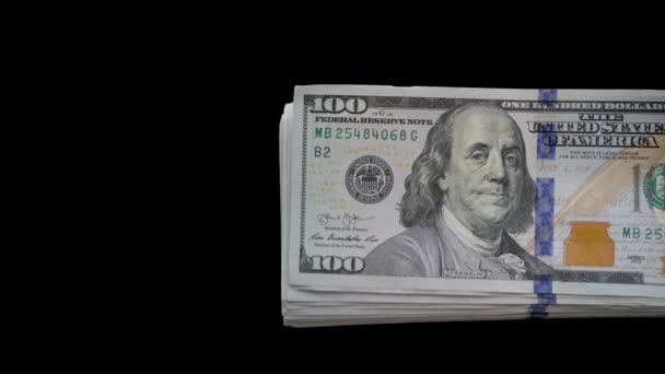 Stack of Dollars comes out of the corner on a Black background — Stock Video