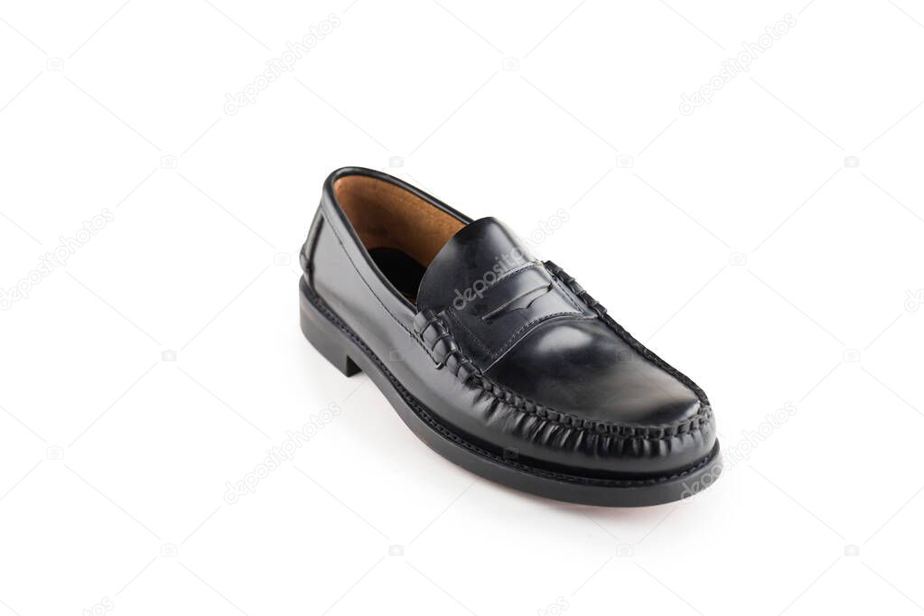 Black leather classic moccasins stylish shoes isolated on a white background.