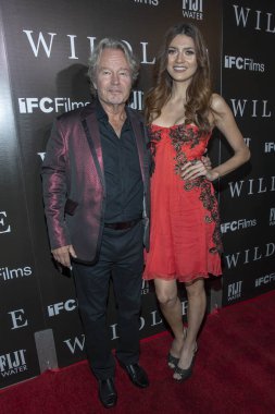 Beverly Hills, California, USA - October 9, 2018: John Savage, Blanca Blanco attending 