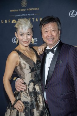 Juju Chan, Tzi Ma 14 Aralık 2019 'da Beverly Hilton, Beverly Hills' deki 18. Unutulmaz Galaya katıldı.