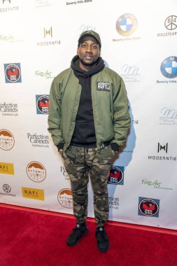 DeStorm Power, 22 Şubat 2019 'da Beverly Hills' teki Waldorf Astoria Hotel 'de Rafi' nin Seçme Hediye Suiti ve Konseri 'ne katıldı.