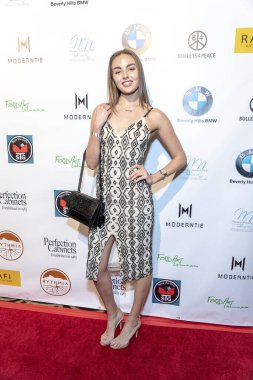 Angelika Nikola, 22 Şubat 2019 'da Beverly Hills' teki Waldorf Astoria Otel 'de düzenlenen Rafi' nin Seçme Hediye Suiti ve Konseri 'ne katıldı.