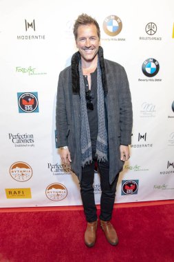 Paul Green, 22 Şubat 2019 'da Beverly Hills, CA' daki Waldorf Astoria Hotel 'de Rafi' nin Seçme Hediye Suiti ve Konseri 'ne katıldı.