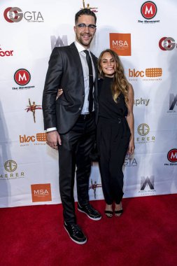 Tony Bellissimo ve Tia Thompson, 23 Ekim 2018 'de Şaban Tiyatrosu, Beverly Hills, Kaliforniya' da düzenlenen 8. Dünya Koreografi Ödüllerine katıldılar.